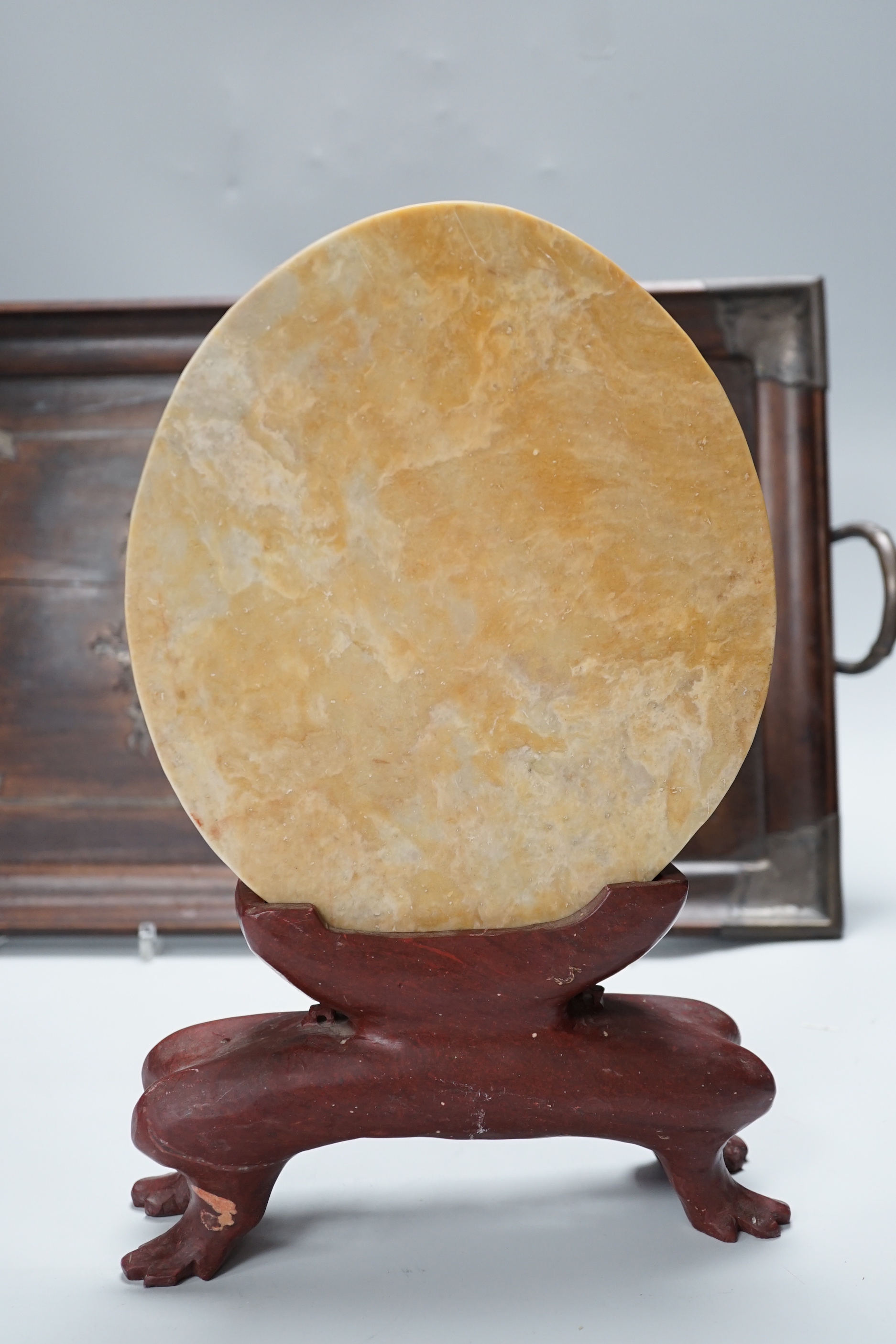 A Chinese white metal mounted hongmu tray and a Chinese carved soapstone table screen on stand, tray 44cm x 29.5cm